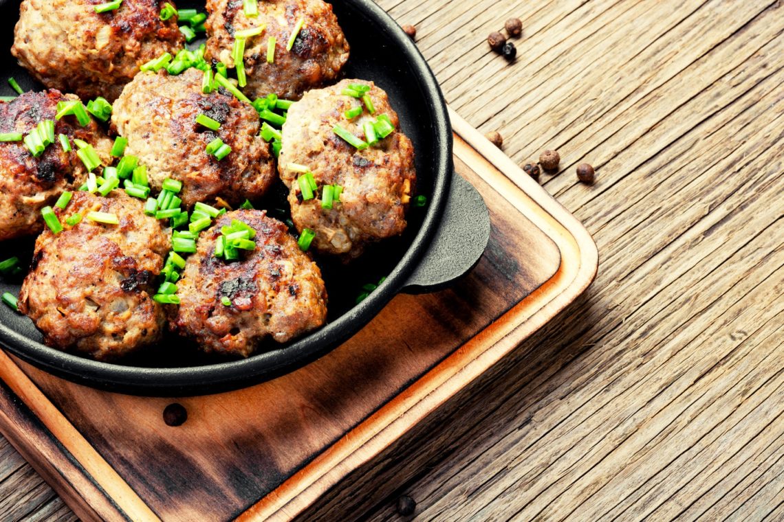 Delicious meatballs in frying pan