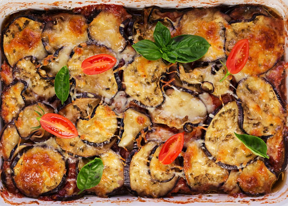 Baked Eggplant With Cheese On A Dark Wooden Table Parmigiana Melanzane Top View Italian Cuisine