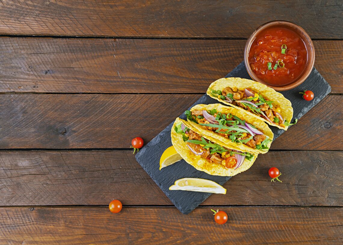 Mexican Tacos With Corn Tortilla And Meat On Wooden Background