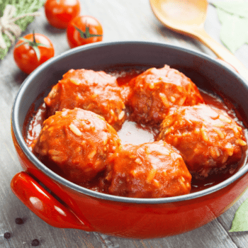 Delicious Turkey Rice Meatballs With Red Wine In A Red Bowl