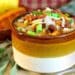 healthy and hearty turkey chili in a brown cup