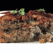 a slice of tasty and easy southwestern style meatloaf recipe on a white plate