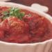 Bolognese Meatballs in a white serving bowl