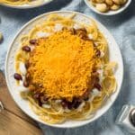 Easy Chili Spaghetti On A Plate Overloaded With Cheese