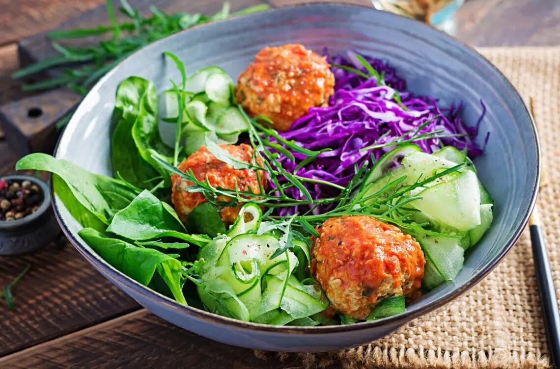 Easy Paleo Meatballs With Vegetable Salad In A Bowl