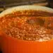 Awesome And Easy Meat Sauce Recipe Cooking In An Orange Casserole