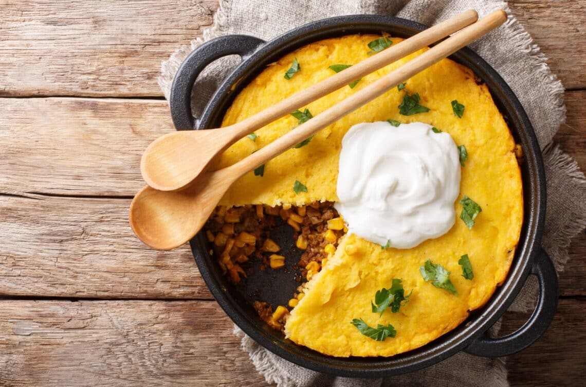 Delicious Beef Tamale Pie With Sour Cream On Top
