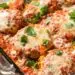 Baked Gluten-Free Eggplant Parmesan Recipe With Lots Of Cheese On Top