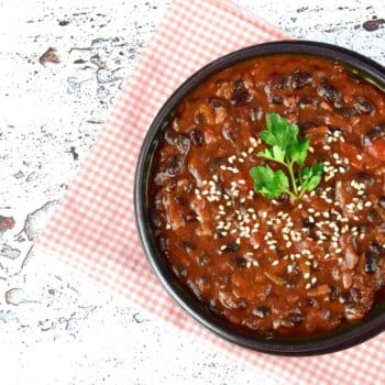 Heartwarming Slow-Cooker Beef Chili With Quinoa in a black bowl