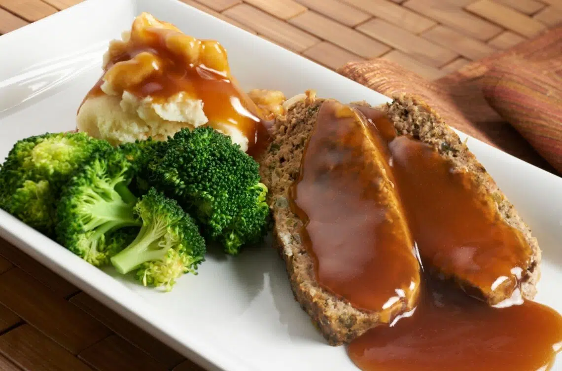 Two Slices Of The Most Amazing Grilled 3-Meat Meatloaf With Mashed Potato And Broccoli