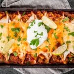 Baked Beef Enchiladas Lined In A 13 By 9 Dish
