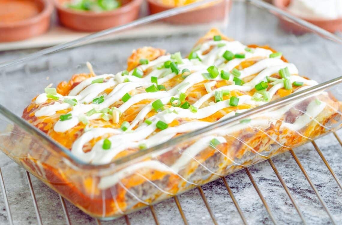 Healthy And Zesty Zucchini Enchiladas In A Baking Dish