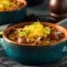 Heartwarming Chiliville Sausage Chili With Cheddar Cheese On Top