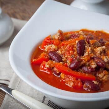 The Best Chilli Con Carne Recipe With Sliced Red Bell Pepper And Red Beans