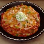 Delicious Beef And Cheese Enchiladas Recipe On A Plate With Sour Cream