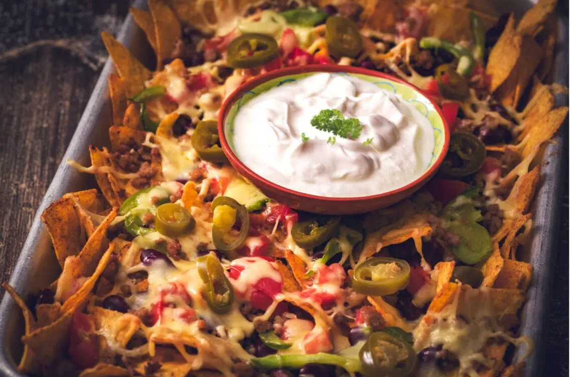 Ultimate Affordable Leftover Nachos With Sour Cream