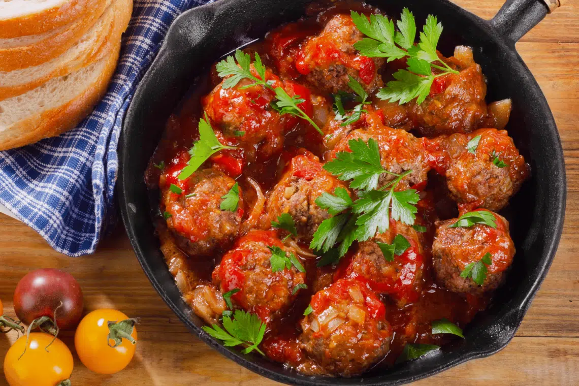 Creamy Meatballs Cooked In Tomato Sauce