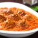 Irresistible Homemade Meatballs In Marinara Sauce In A White Bowl