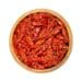 Sun dried tomatoes, Julienne strips in a wooden bowl, from above