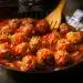 Delicious Meatballs Made From Ground Beef In A Spicy Tomato Sauce Served In A Skillet Or Old Metal Pan In A Restaurant